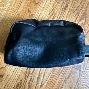 Black toiletry bag never used